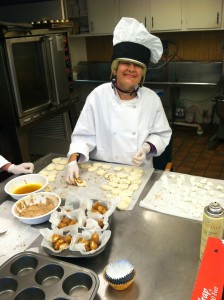 Dawn works with a Floberg Center cook to prepare the goodies for the farmer's market.