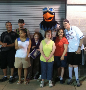 David, Andy, Tribecca, Dee, Ann, Tina and Kurt hang out with Rocko The Riverhawks mascot.