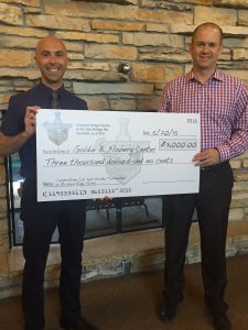 Richard Spanton Jr (Copperstone Cup) presents check to John Pingo (CEO for Goldie Floberg)
